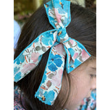 Bow in Turquoise and Coral Liberty of London